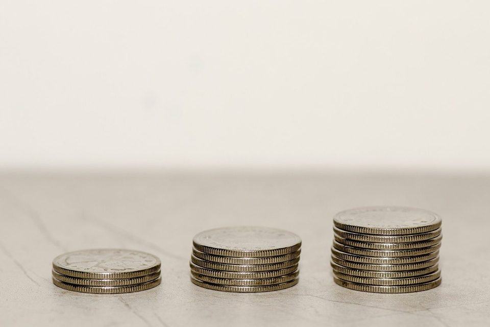 Small stacks of Canadian coins on a table