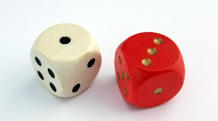 A white and a red six-sided die
