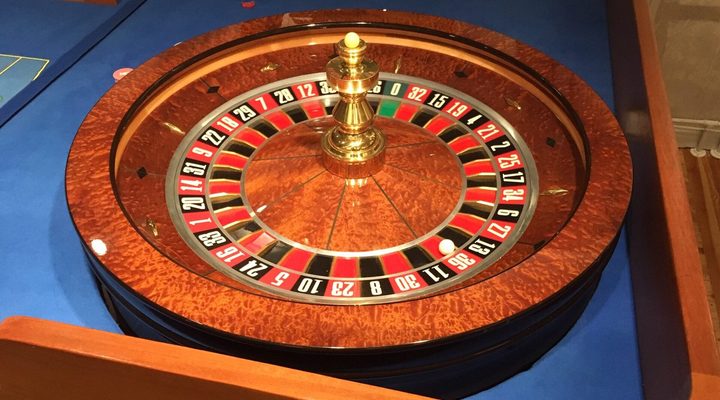 Roulette wheel in a wooden bowl